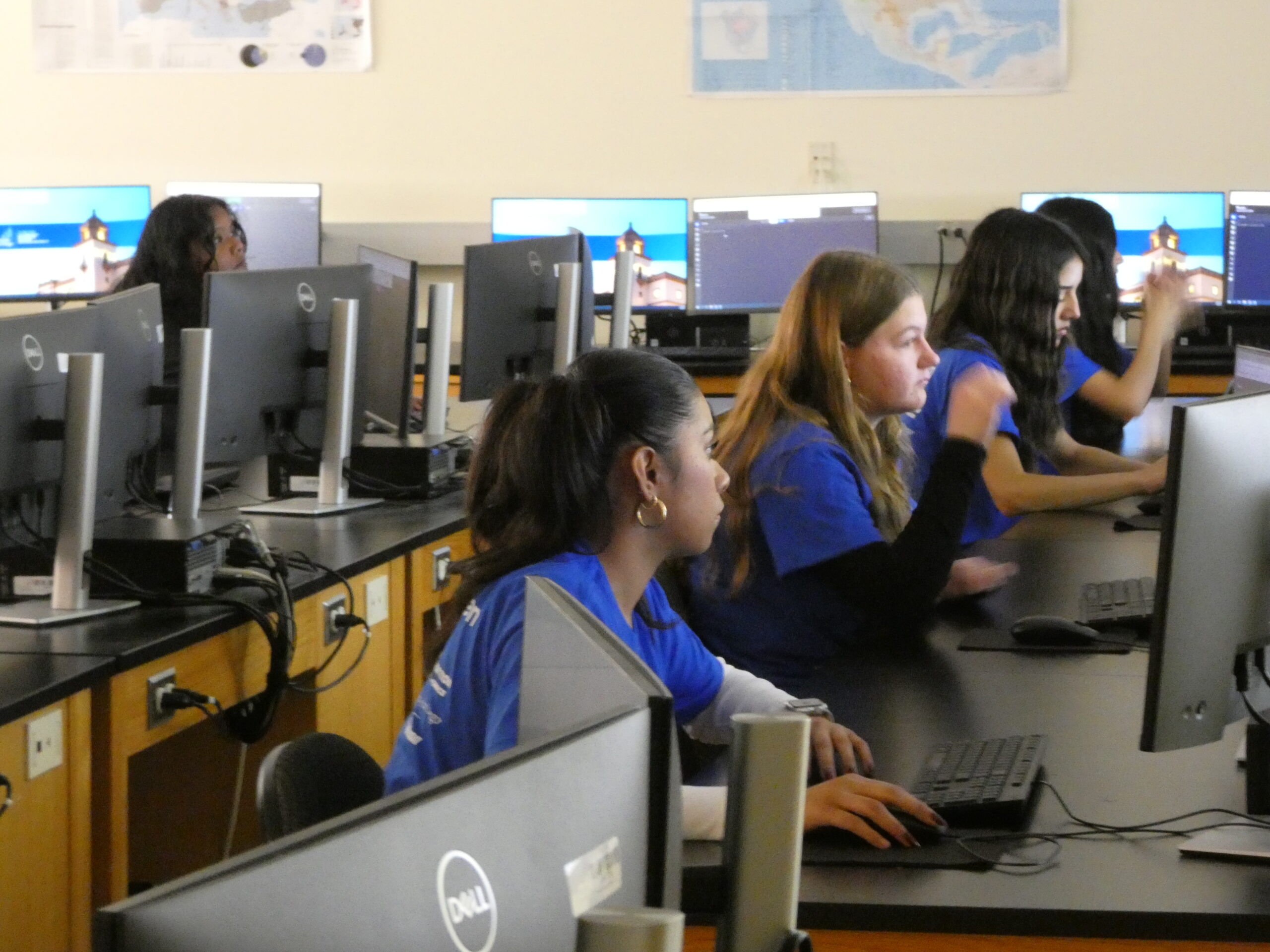 Students looking at their computer screens
